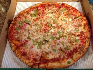 Mikey's Pizza Pit Stop in Knox, IN_Sausage, Green Olive, and Garlic Pizza