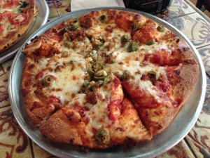 Spanky's Pizza in Houston, Texas_Sausage, Green Olive, and Garlic Pizza on New York-Style Crust